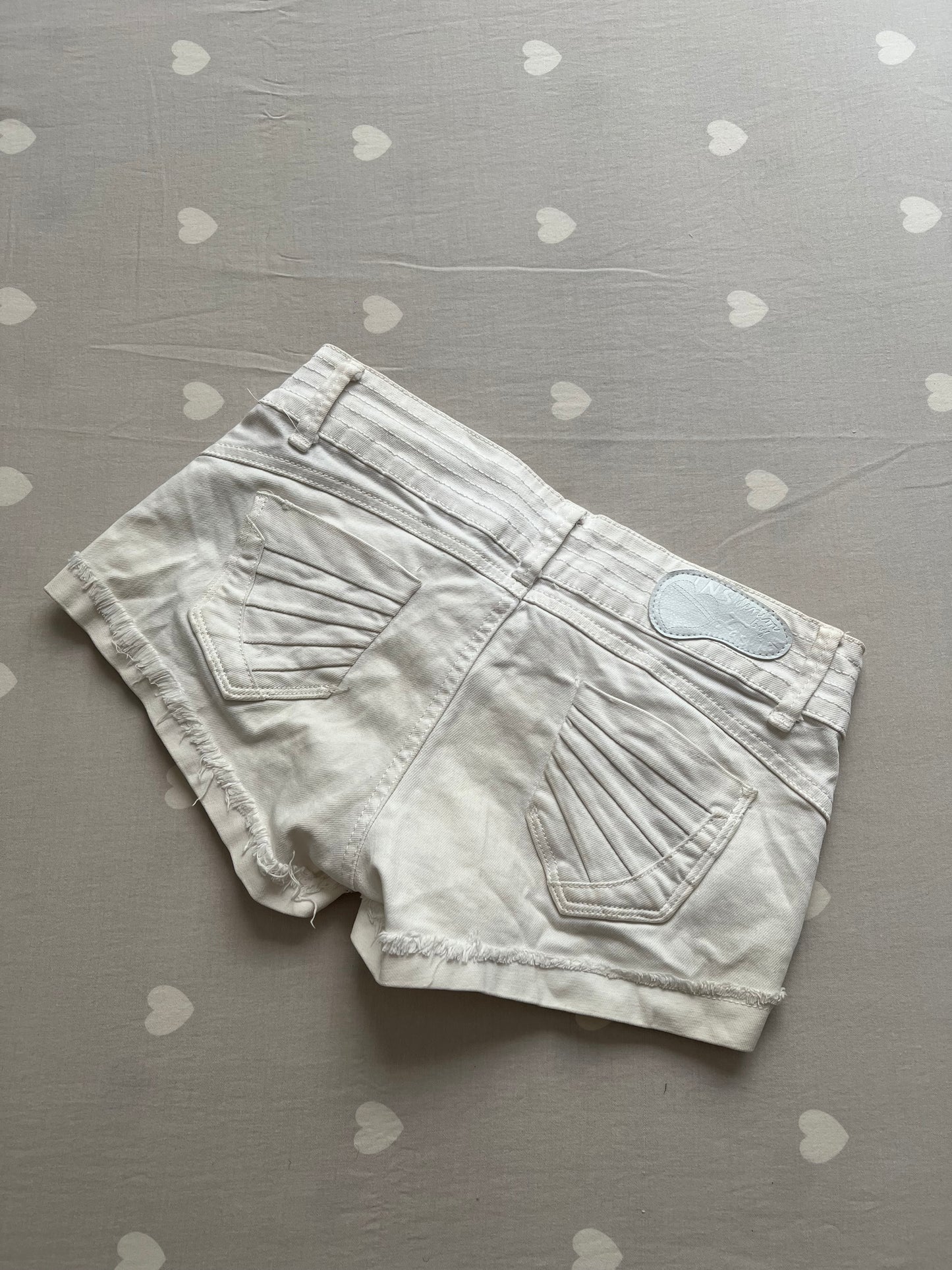 White distressed shorts