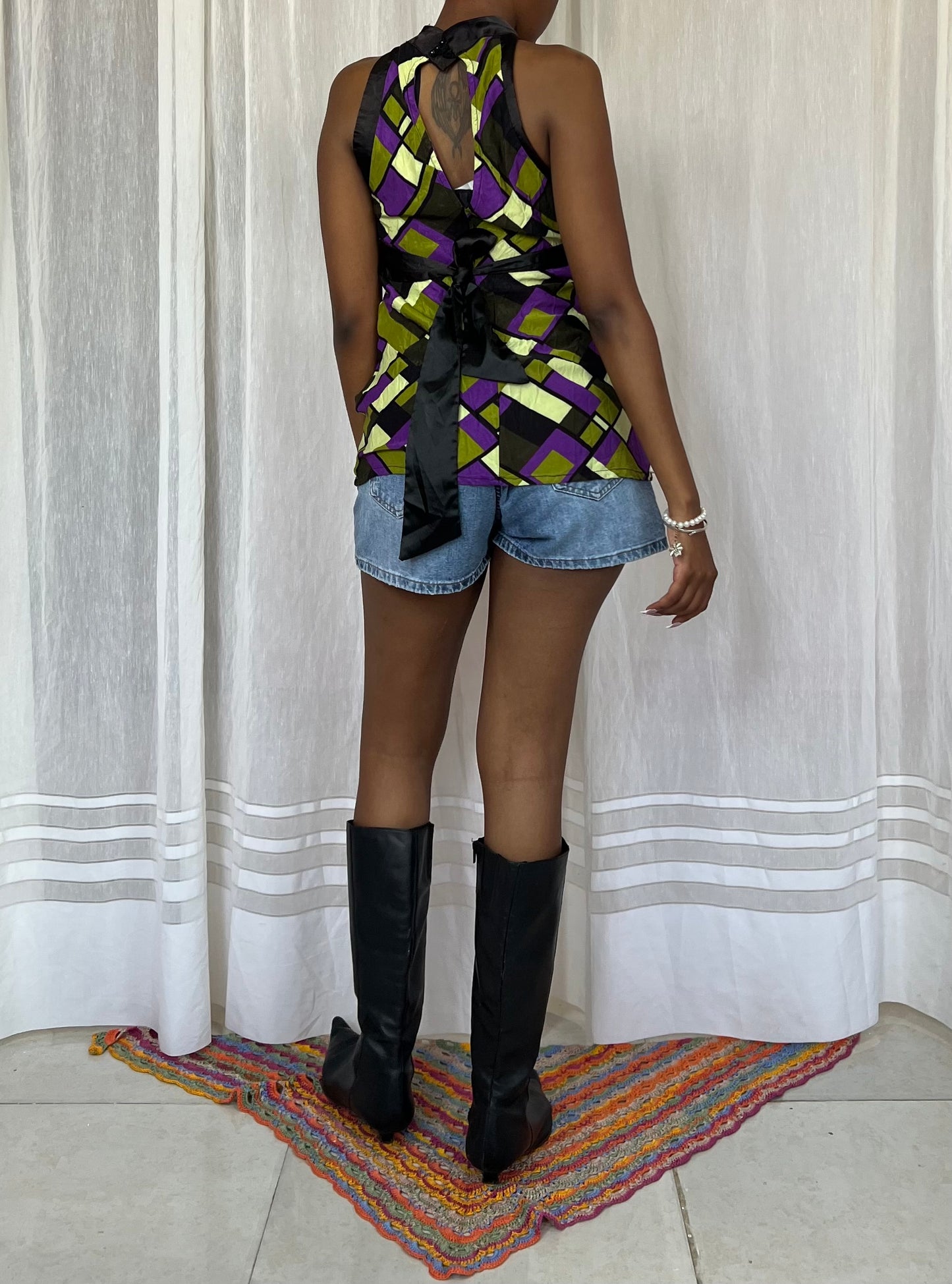 Abstract Tie-Back Halter