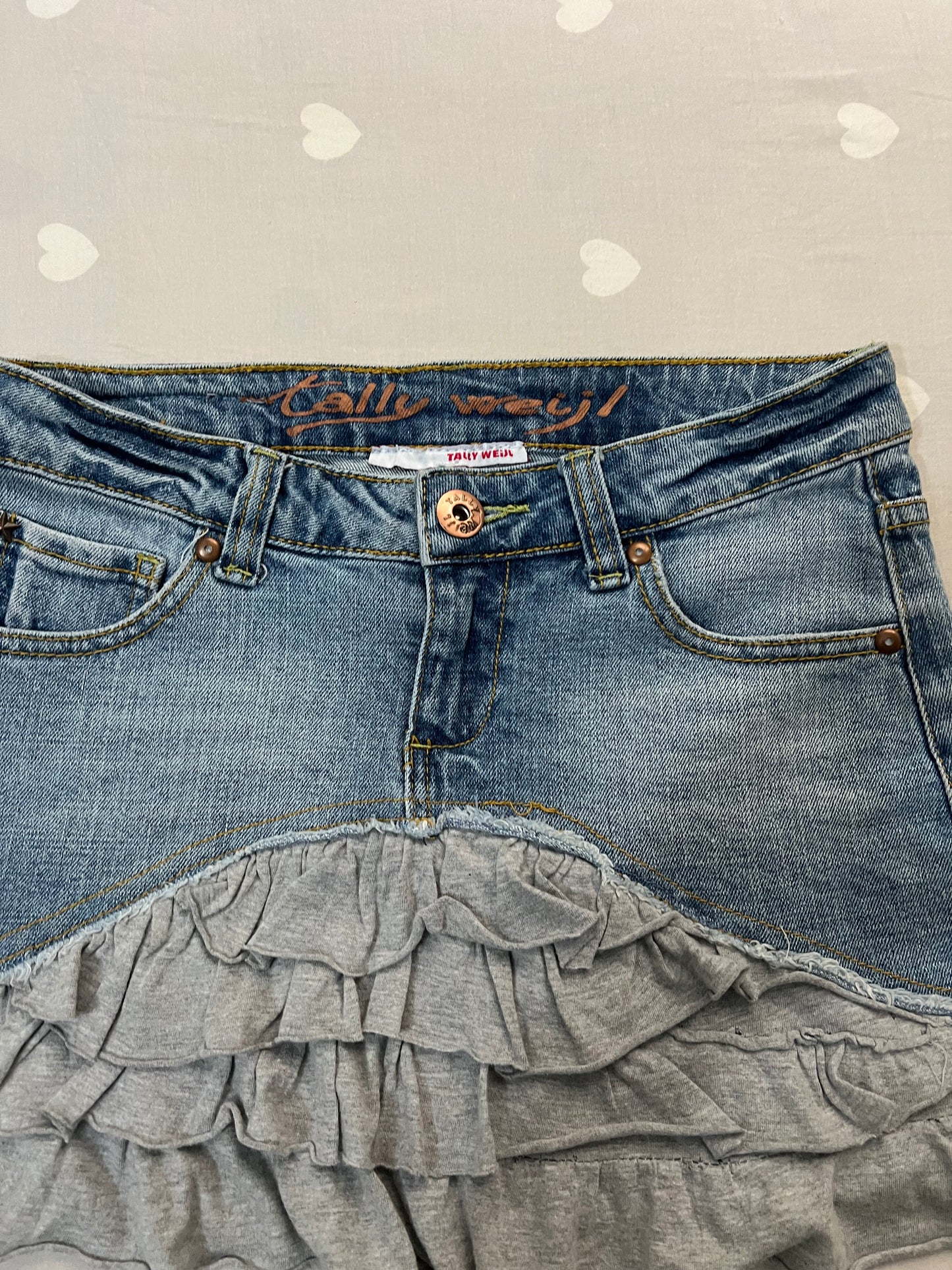 Reworked denim mini skirt