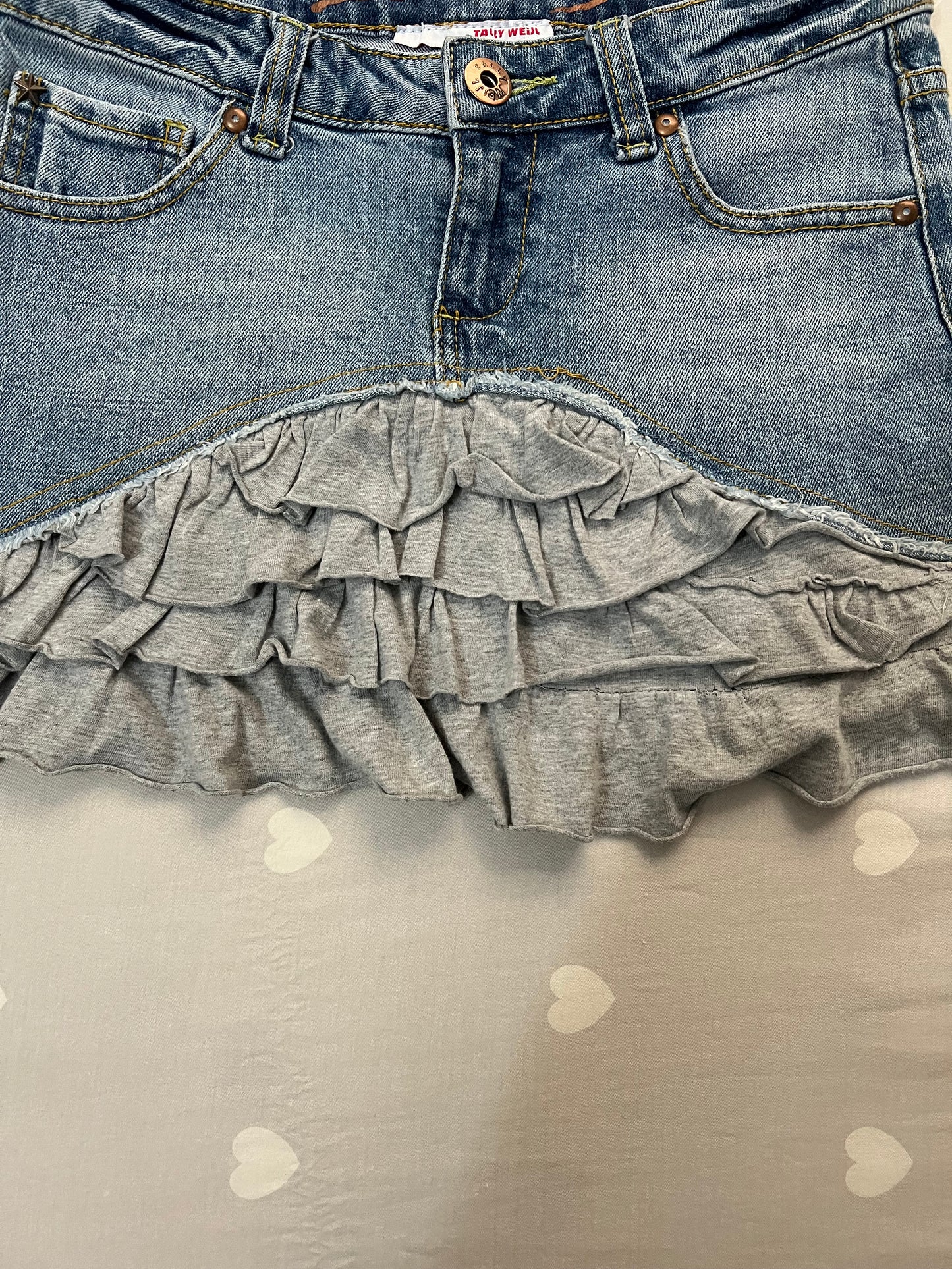 Reworked denim mini skirt