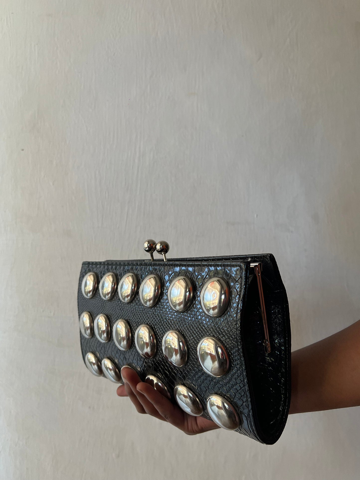 Studded leather clutch purse