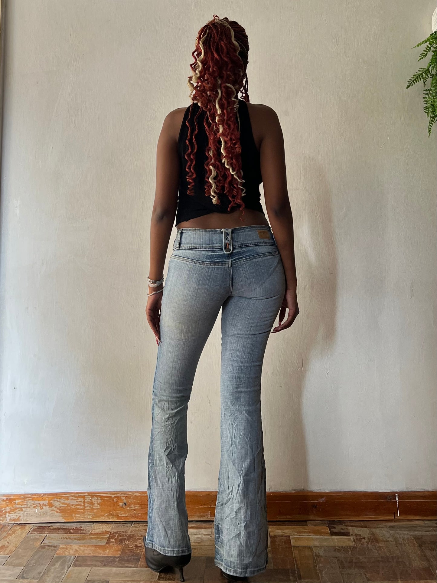 Super lowrise light wash boot cut jeans