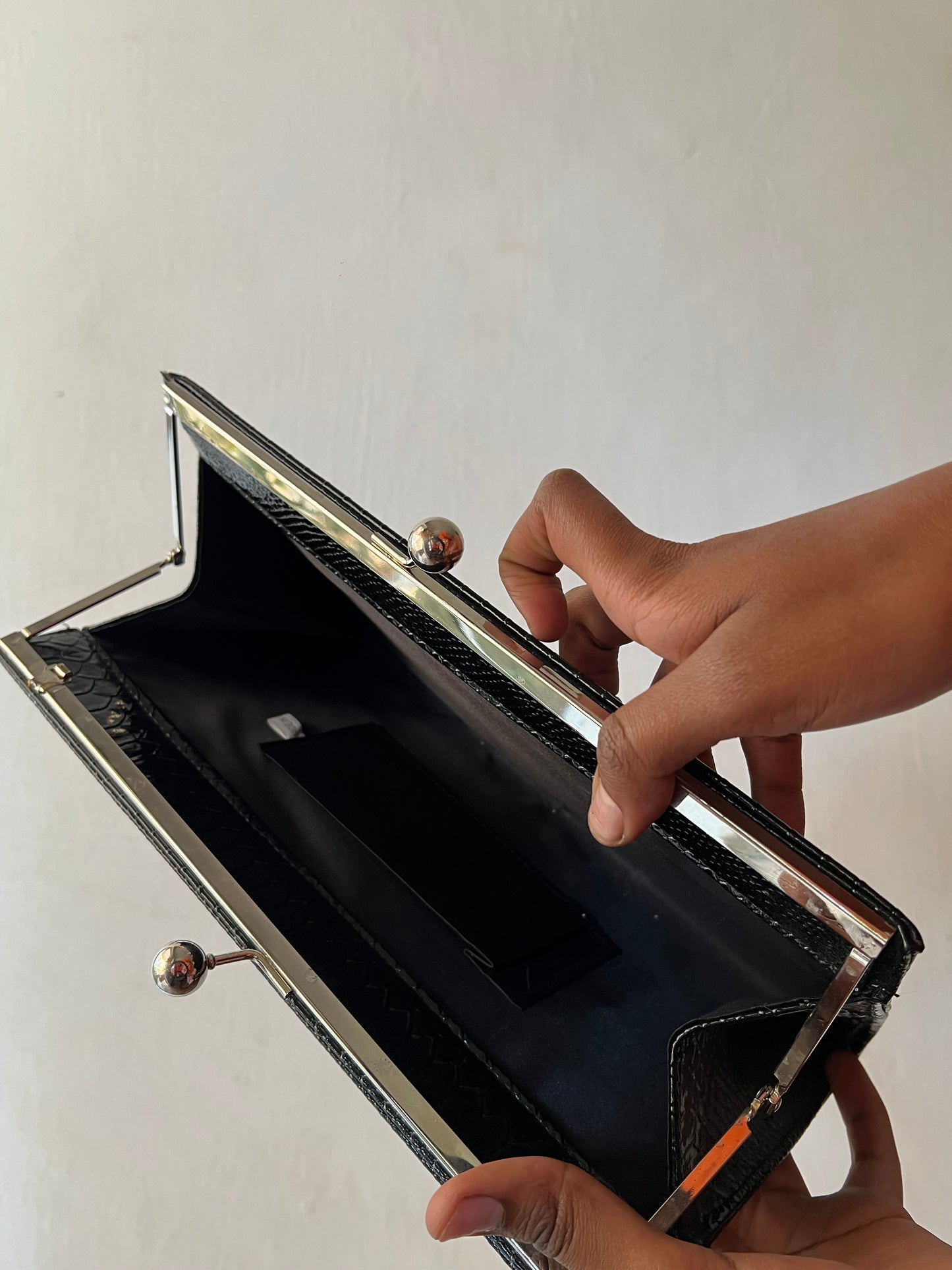 Studded leather clutch purse