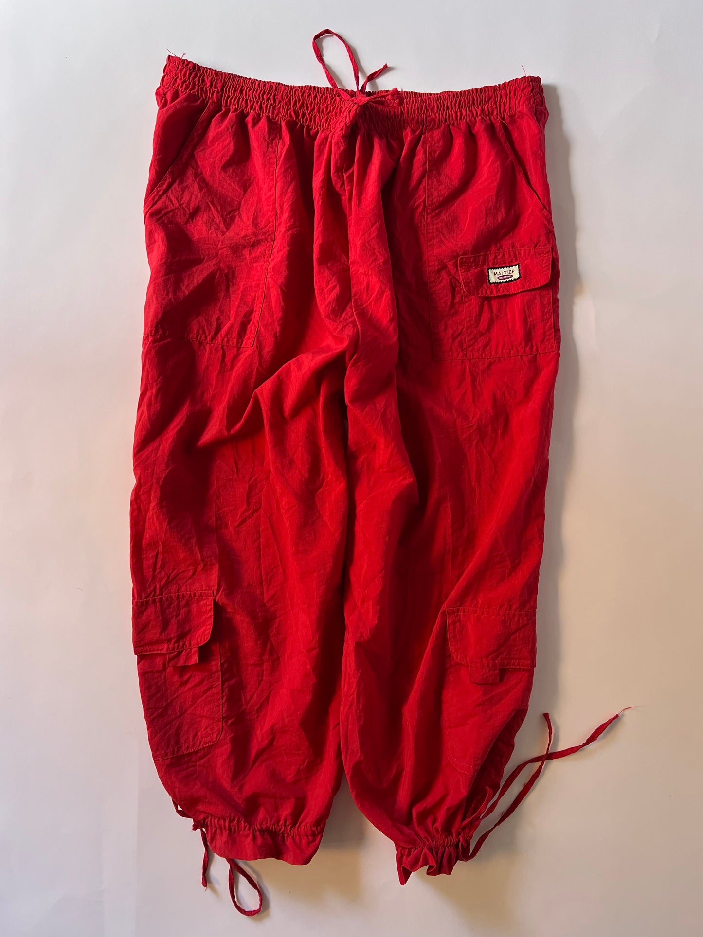 Red parachute capri pants