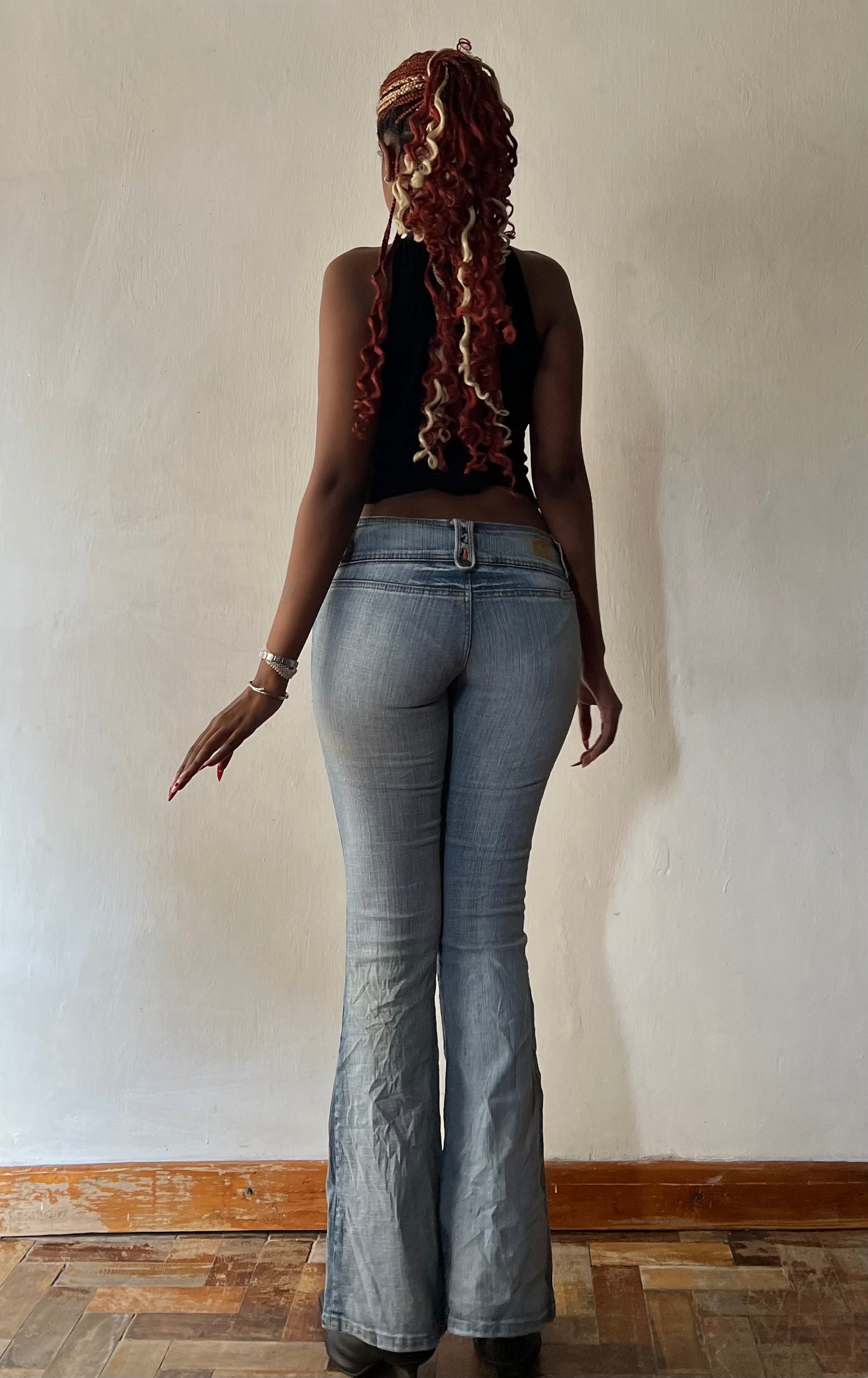 Super lowrise light wash boot cut jeans