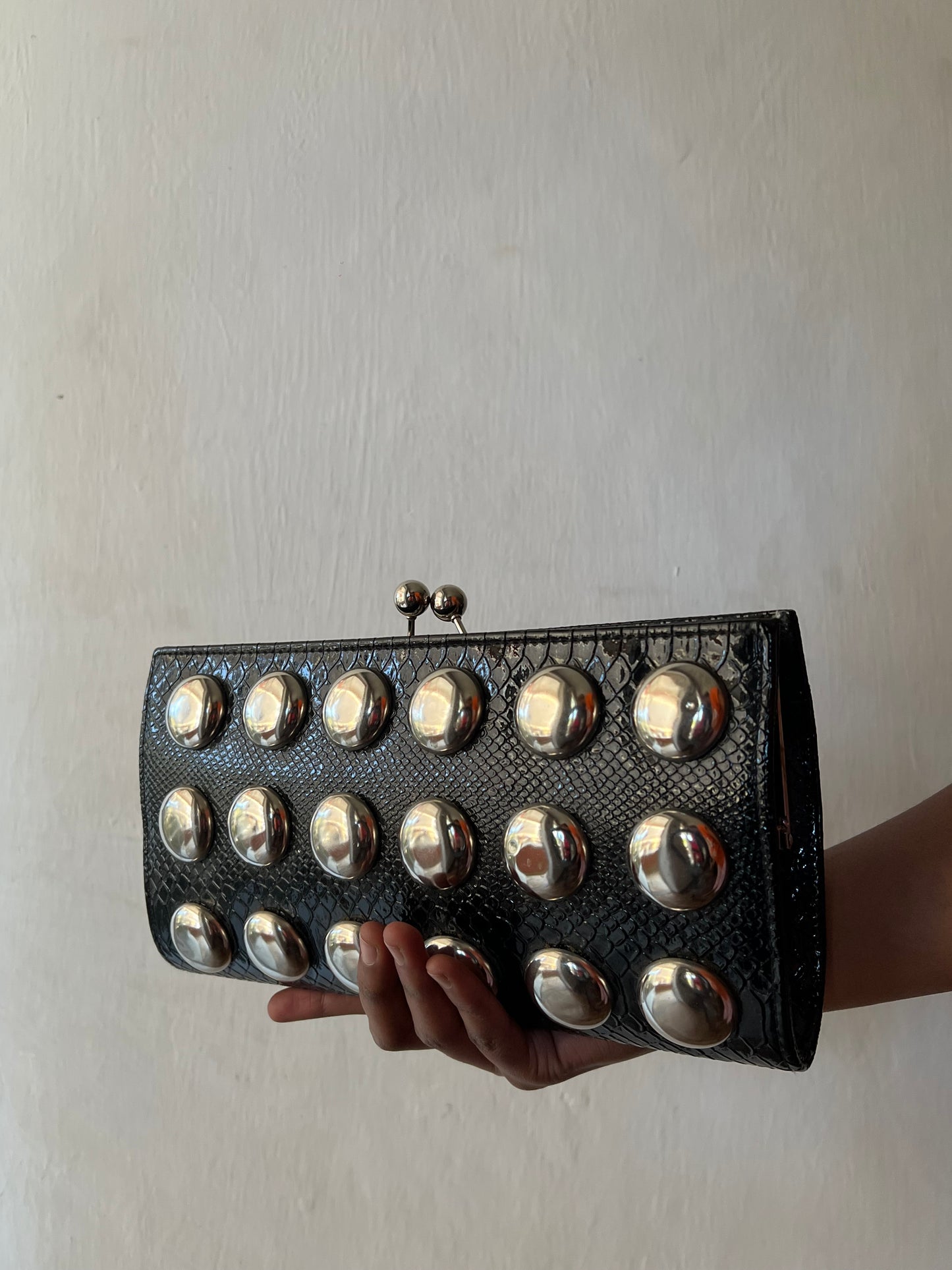 Studded leather clutch purse