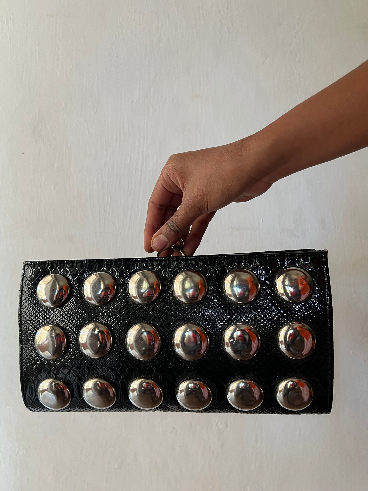Studded leather clutch purse