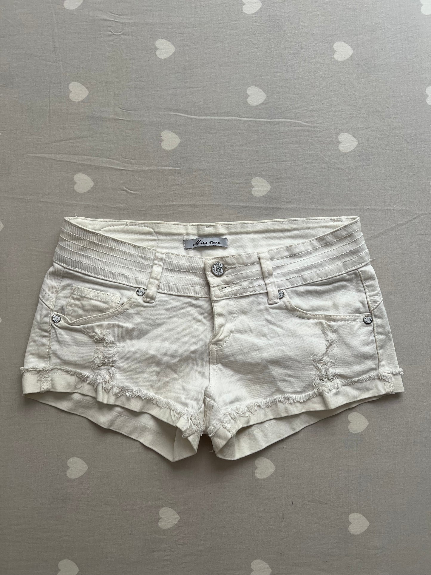 White distressed shorts