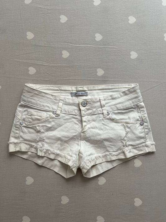 White distressed shorts