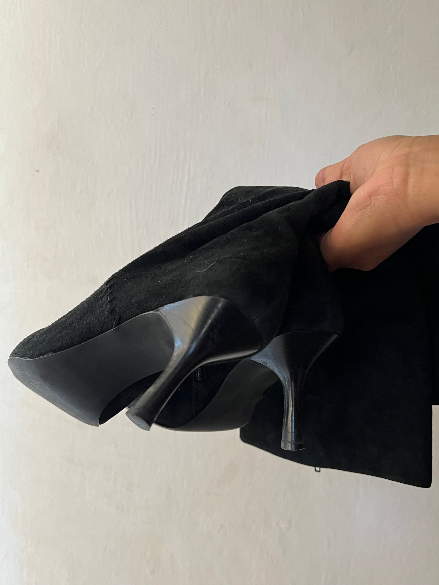 Black pointy toe knee high boots