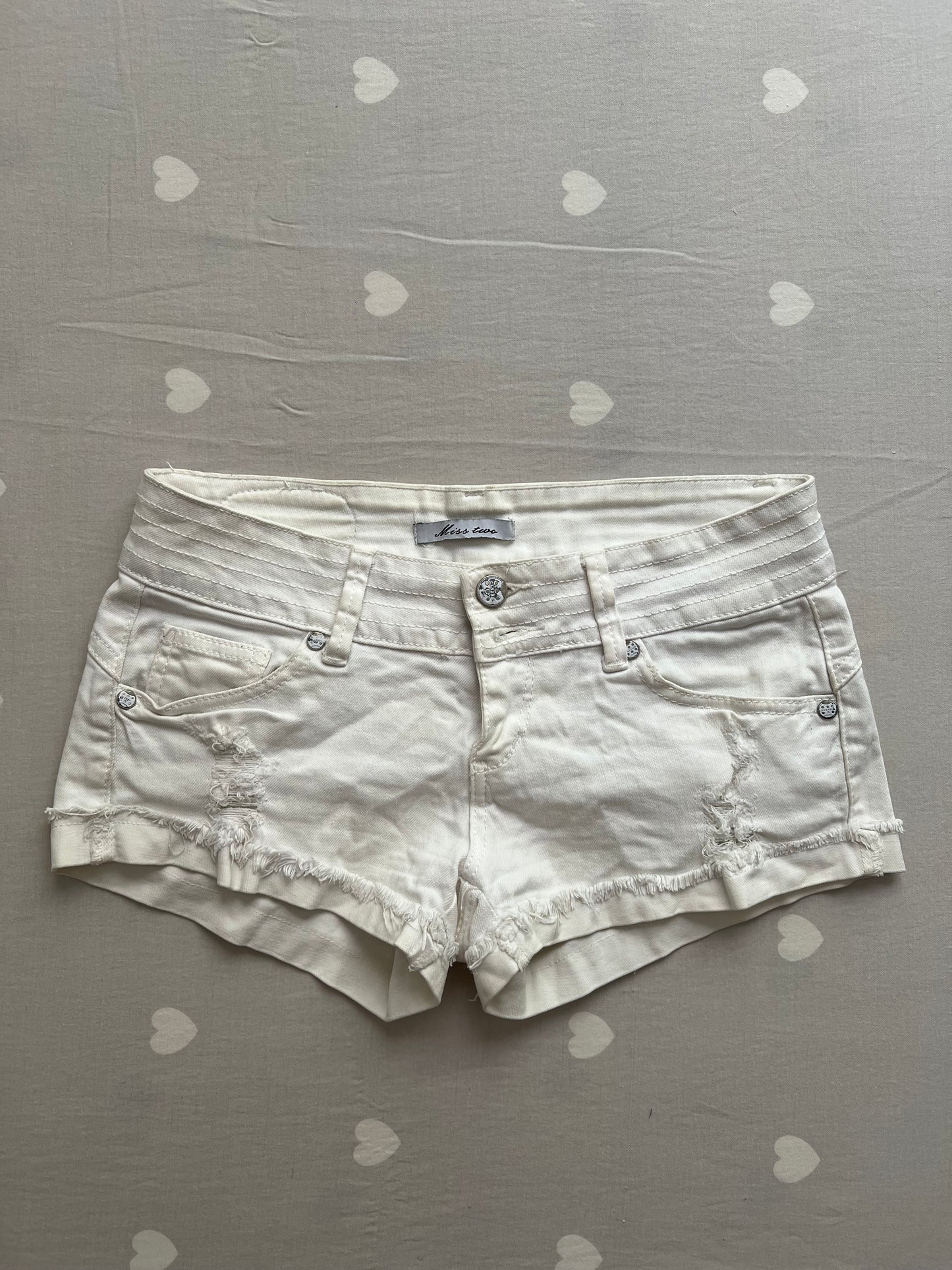 White distressed shorts