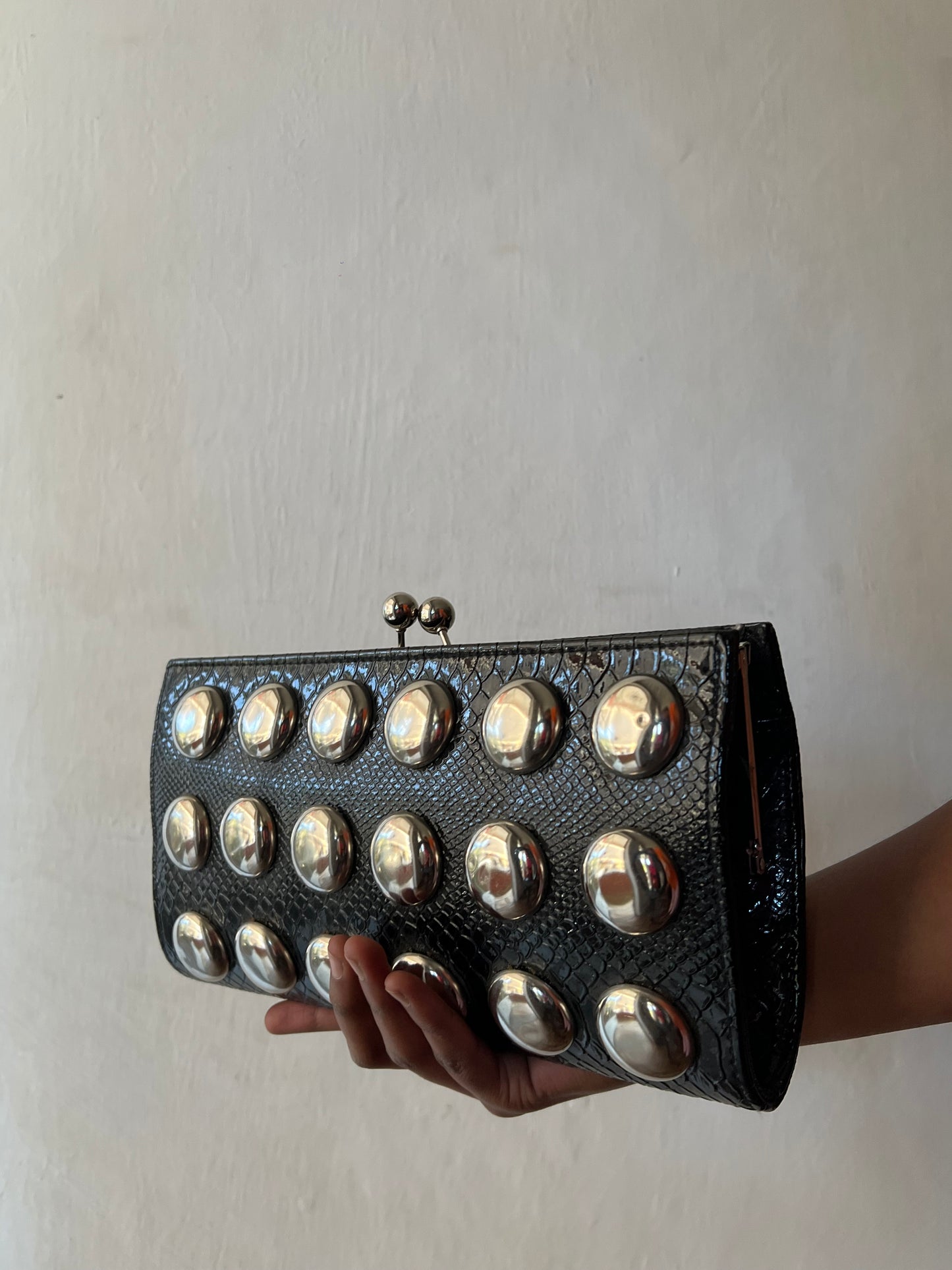 Studded leather clutch purse