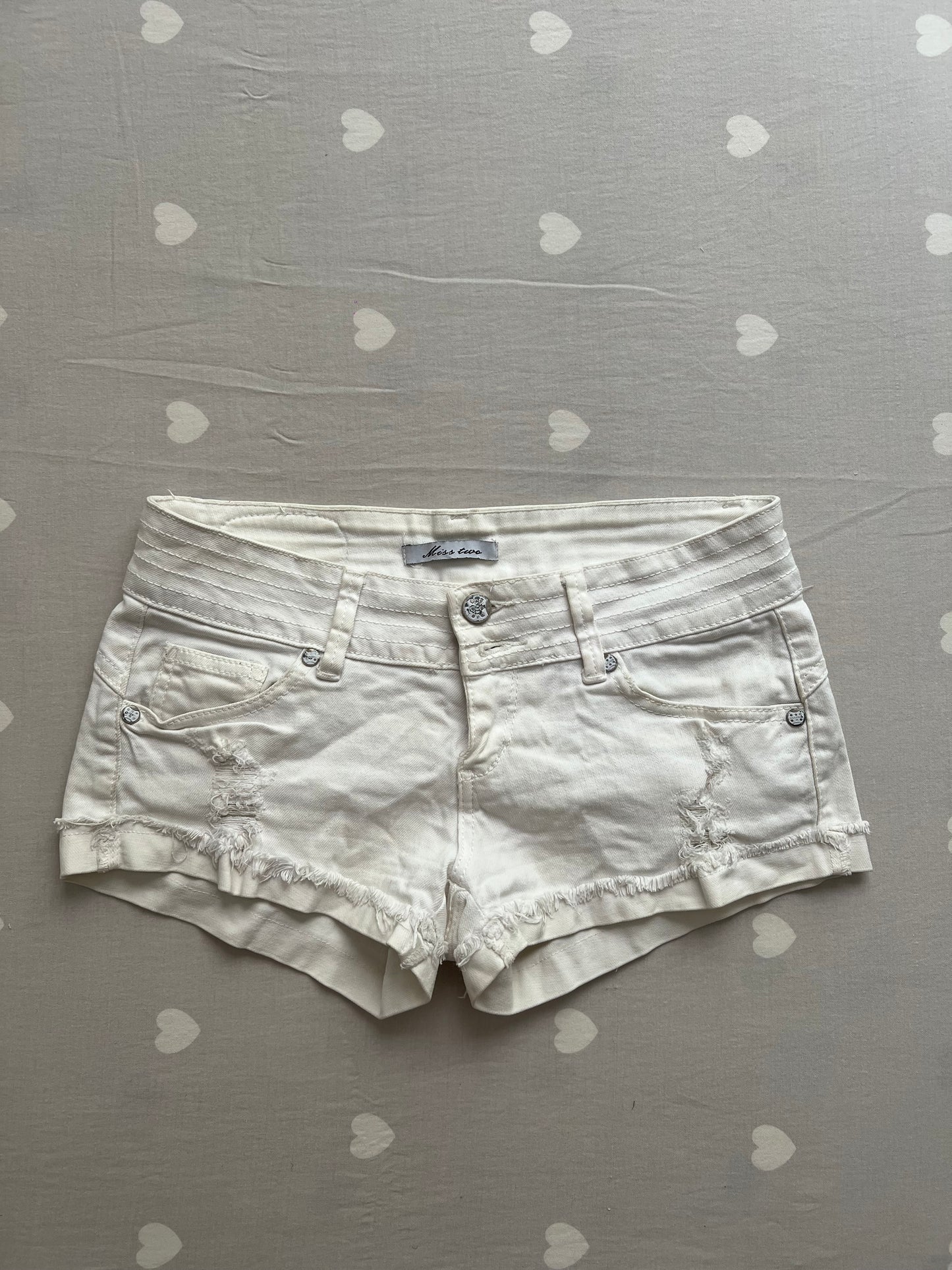 White distressed shorts